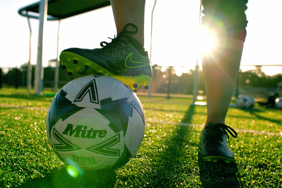 Facility features: Mitre football with boot on the ball